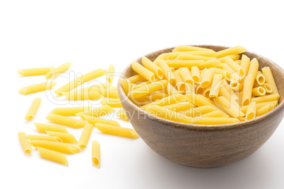 Raw fresh penne isolated on white