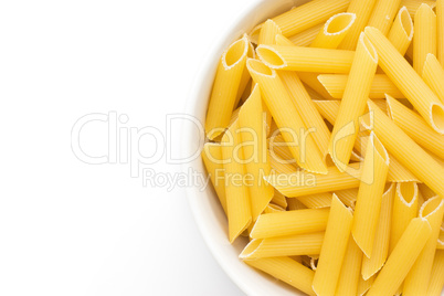 Raw fresh penne isolated on white