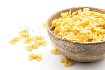 Raw fresh farfalle isolated on white