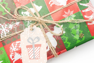 Present box tied on white background