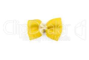 Colourful raw farfalle isolated on white