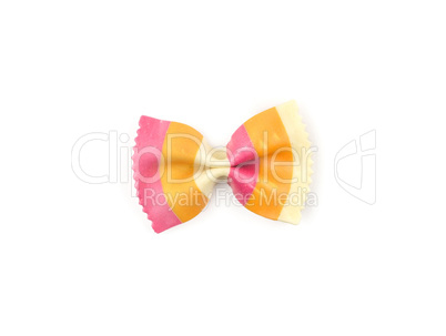 Colourful raw farfalle isolated on white