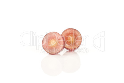 Raw fresh red globe grape isolated on white