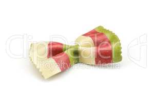 Colourful raw farfalle isolated on white
