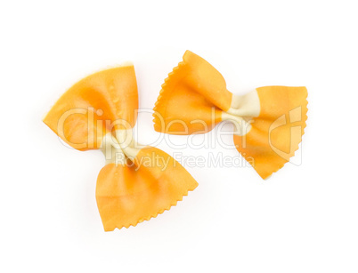 Colourful raw farfalle isolated on white