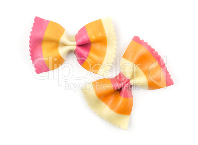 Colourful raw farfalle isolated on white