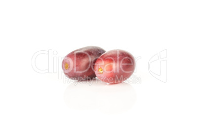 Raw fresh red globe grape isolated on white