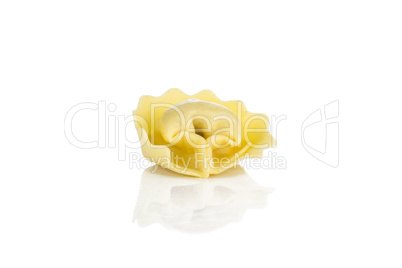 Fresh Raw tortellini pasta isolated on white