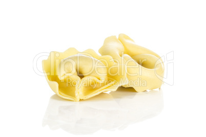 Fresh Raw tortellini pasta isolated on white