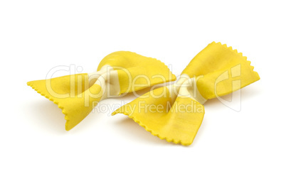 Colourful raw farfalle isolated on white