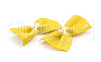 Colourful raw farfalle isolated on white