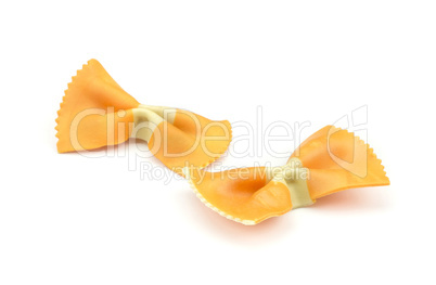 Colourful raw farfalle isolated on white