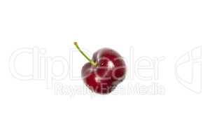 Fresh raw sweet red cherry isolated on white