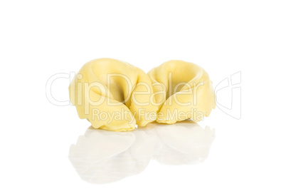 Fresh Raw tortellini pasta isolated on white