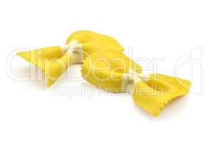 Colourful raw farfalle isolated on white