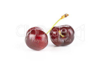 Fresh raw sweet red cherry isolated on white