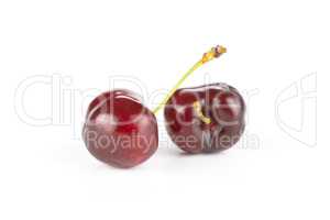 Fresh raw sweet red cherry isolated on white