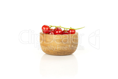 Fresh raw red currant isolated on white