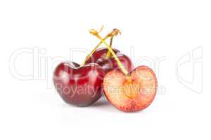 Fresh raw sweet red cherry isolated on white