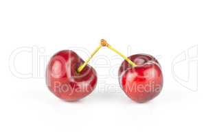 Fresh raw sweet red cherry isolated on white