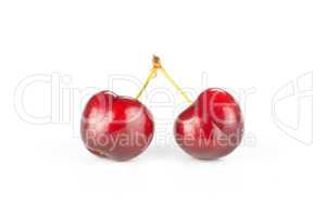 Fresh raw sweet red cherry isolated on white