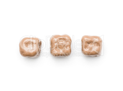 Coconut cubes isolated on white