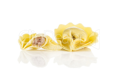 Fresh Raw tortellini pasta isolated on white