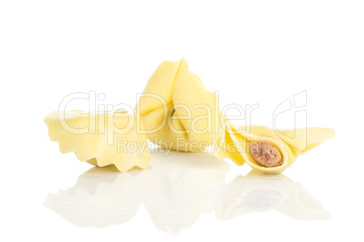 Fresh Raw tortellini pasta isolated on white