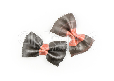 Colourful raw farfalle isolated on white