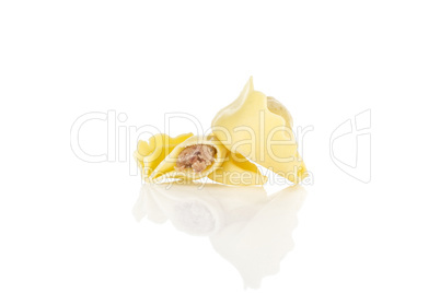 Fresh Raw tortellini pasta isolated on white