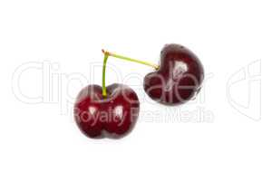 Fresh raw sweet red cherry isolated on white