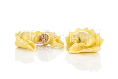 Fresh Raw tortellini pasta isolated on white