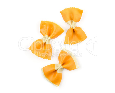 Colourful raw farfalle isolated on white