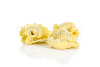 Fresh Raw tortellini pasta isolated on white