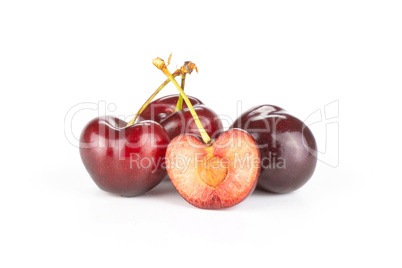 Fresh raw sweet red cherry isolated on white