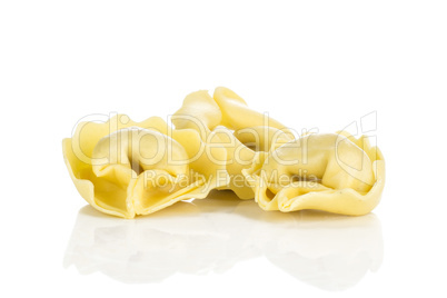 Fresh Raw tortellini pasta isolated on white