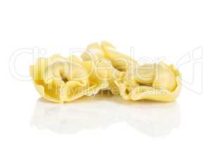 Fresh Raw tortellini pasta isolated on white