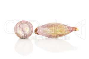 Fresh raw long shallot onion isolated on white