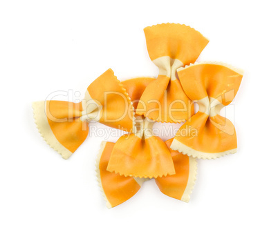 Colourful raw farfalle isolated on white