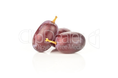 Raw fresh red globe grape isolated on white