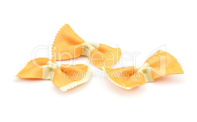 Colourful raw farfalle isolated on white