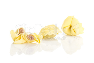 Fresh Raw tortellini pasta isolated on white