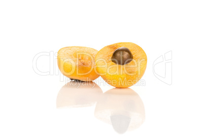 Fresh raw orange japanese loquat isolated on white