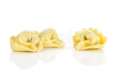 Fresh Raw tortellini pasta isolated on white