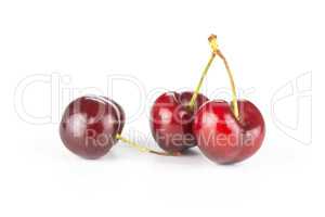 Fresh raw sweet red cherry isolated on white