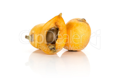 Fresh raw orange japanese loquat isolated on white