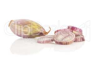 Fresh raw long shallot onion isolated on white