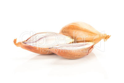 Fresh raw long shallot onion isolated on white