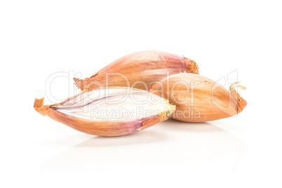 Fresh raw long shallot onion isolated on white