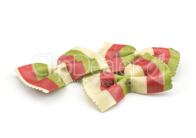 Colourful raw farfalle isolated on white